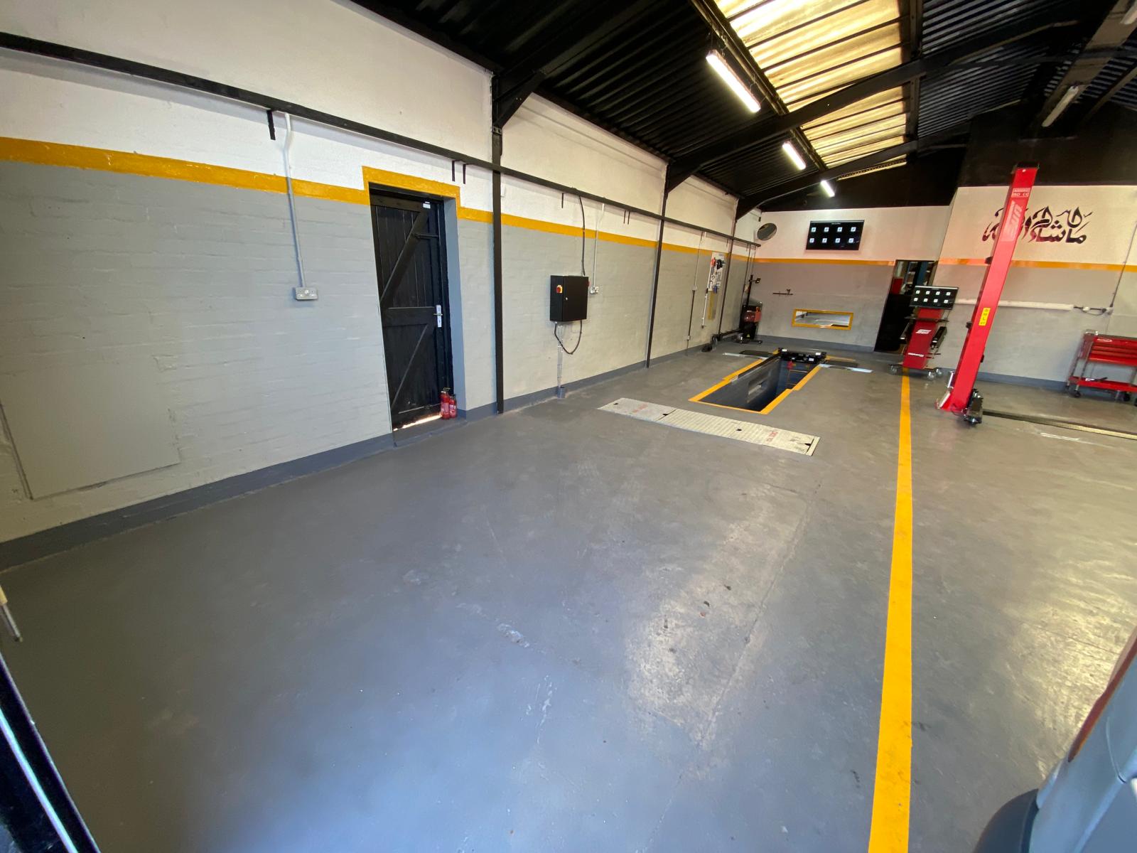 Four-wheel alignment bay at Auto Tech Coventry